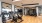 Large fitness center with large windows and plenty of equipment